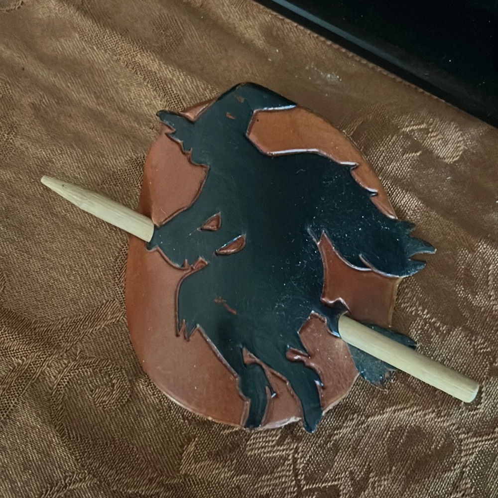 Handcrafted leather tooled witch on broom hair stick pin